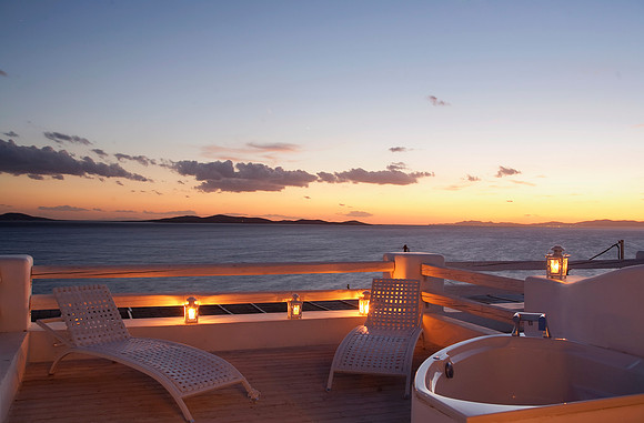 Terrace in a Junior Suite with outdoor Jacuzzi at the Mykonian Mare Resort